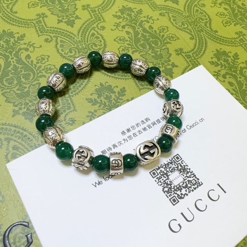 G*u*i bracelets